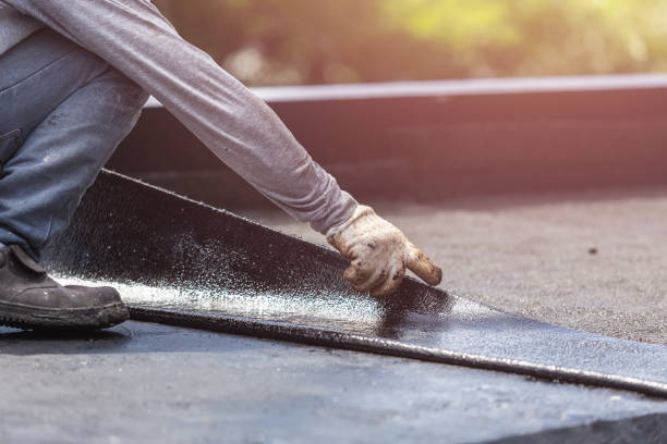 Professional Exterior Waterproofing technician working in Dayton, NJ